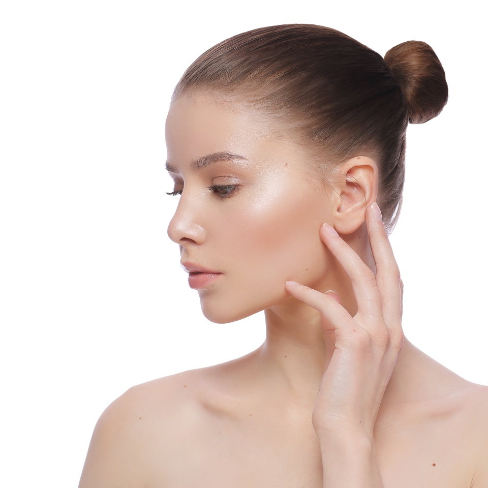 Portrait of a beautiful young woman, skin care and hands with manicure