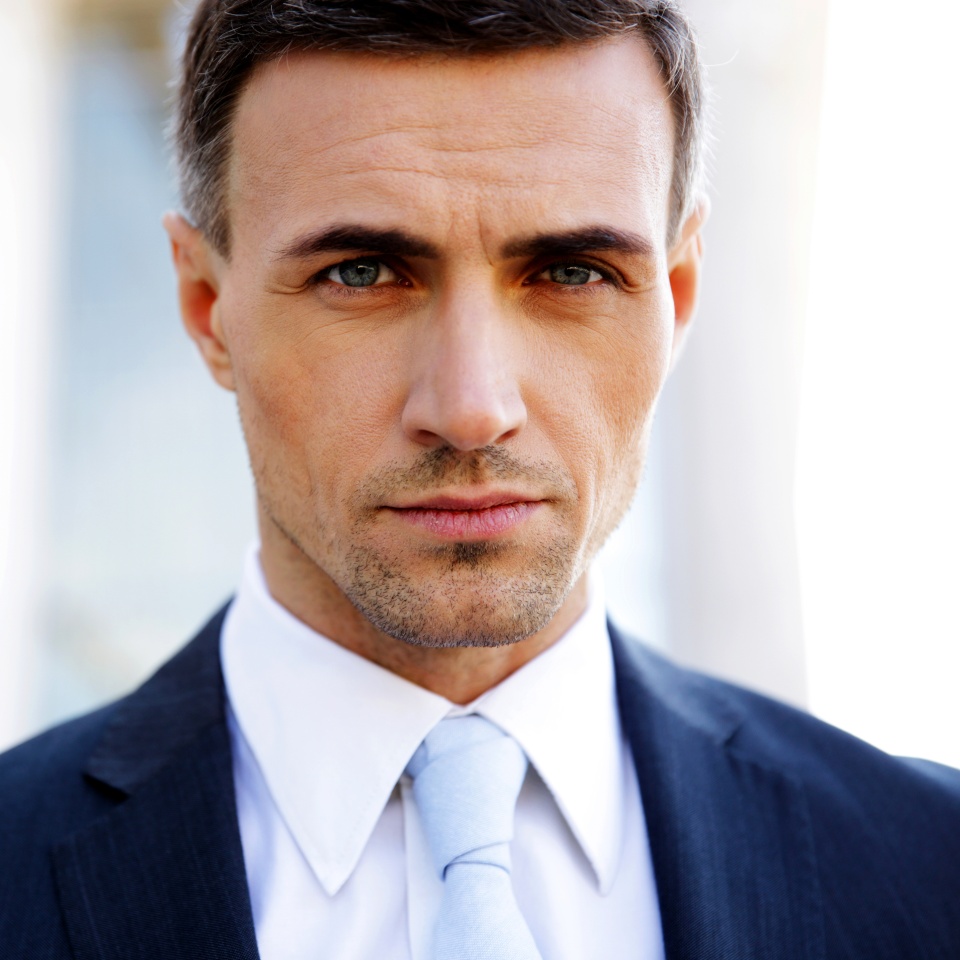 Portrait of a confident businessman looking at camera