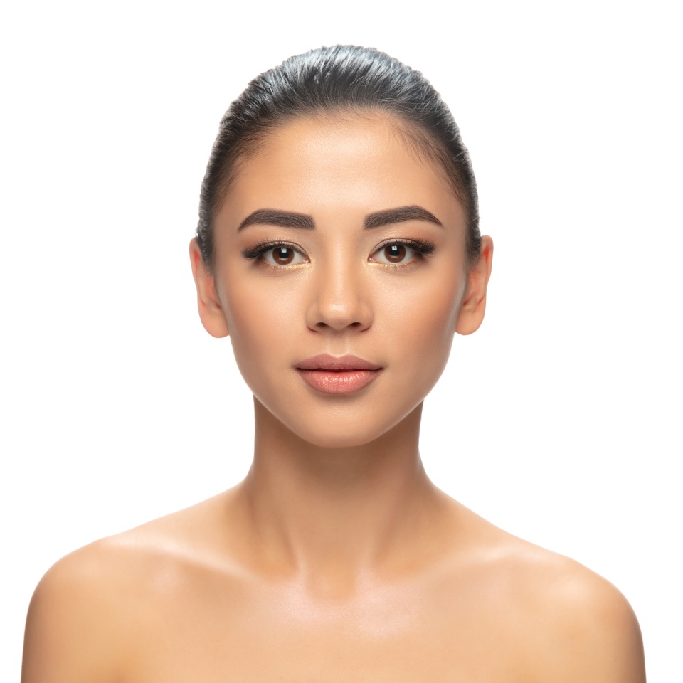 Well-kept. Portrait of beautiful young woman on white studio background. Concept of cosmetics, makeup, natural and eco treatment, skin care. Shiny and healthy look, fashion, healthcare. Copyspace.