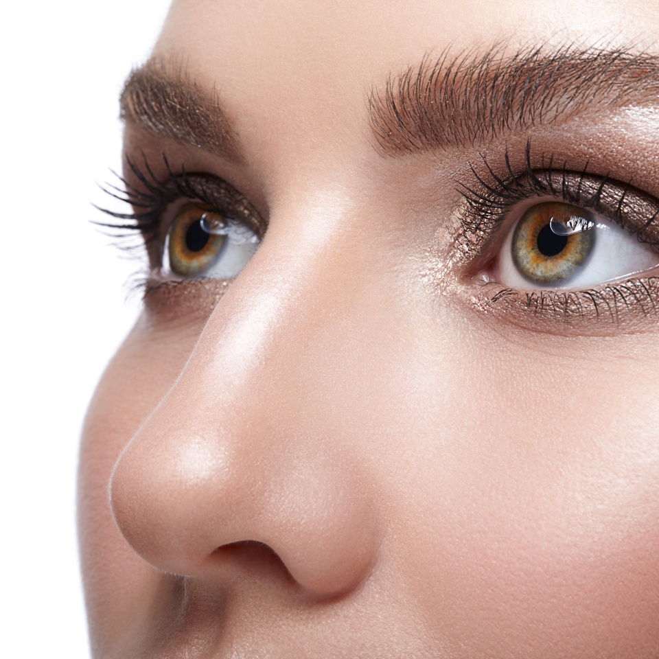 Closeup shot of female face with eye day makeup